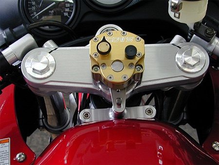 Роторный рулевой демпфер мотоцикла.