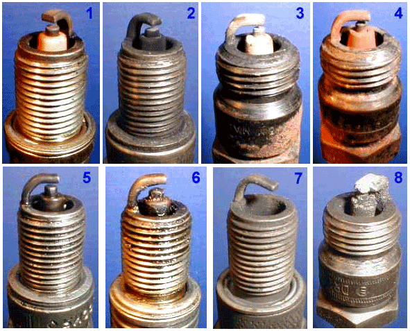 Свечи зажигания на которых показан разный нагар