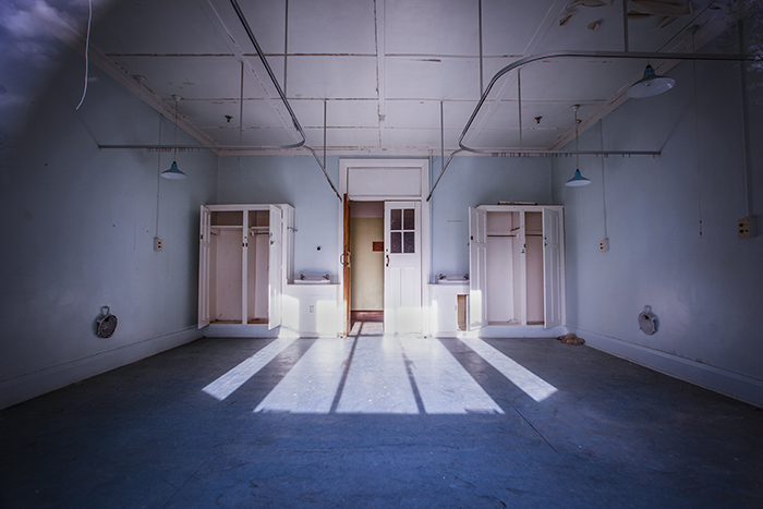 A scary, haunted abandoned hospital room flooded with light - using color in photography.